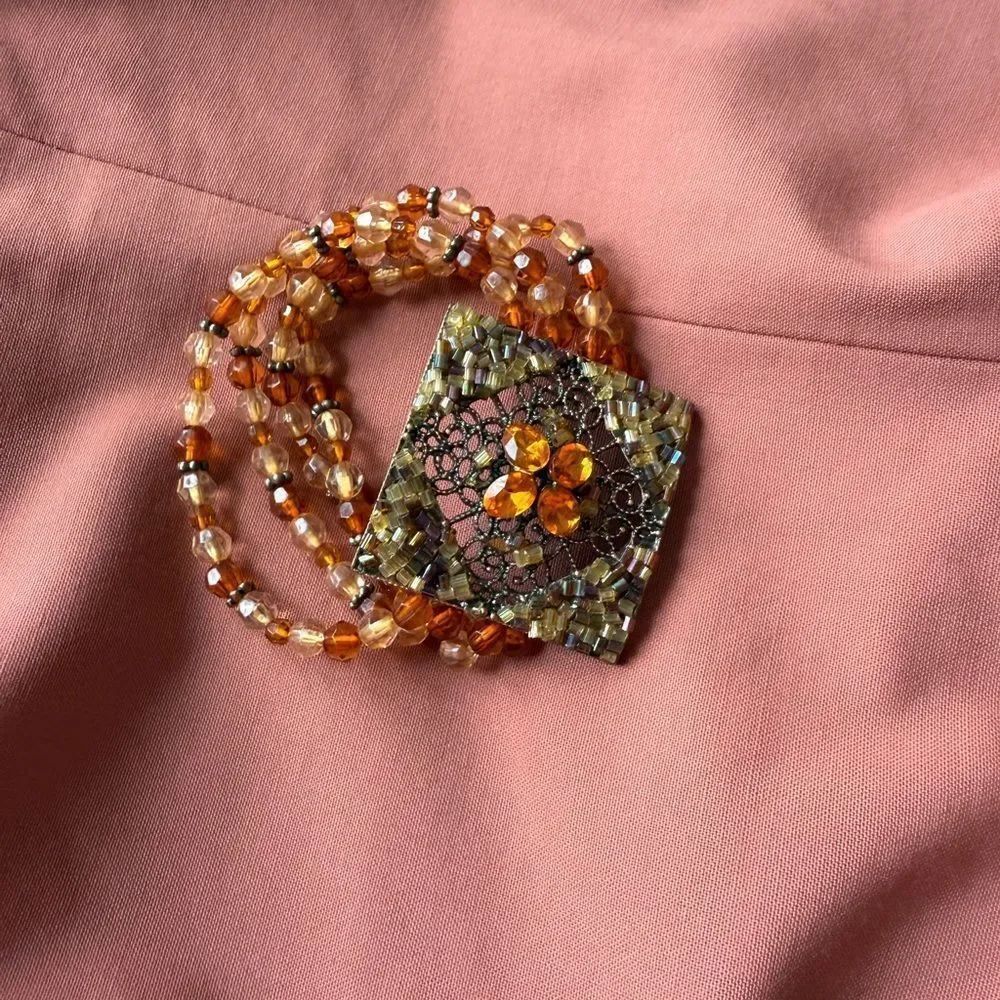 Y2K Multi-stranded Bracelet with a faux Amber Glass, Gems Statement Pendant